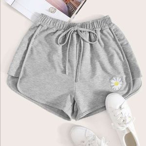 SHEIN Light gray shorts with flower at bottom